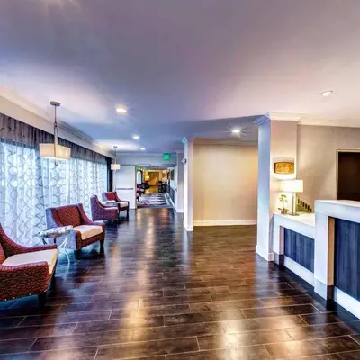 a lobby of a hospital with chairs and a waiting room at Holiday Inn Princeton by IHG in Princeton