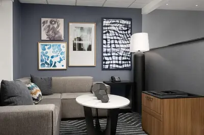 a living room with a couch and a table at Homewood Suites by Hilton Reading-Wyomissing in Wyomissing