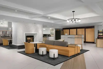 a living room with a couch and a table at Homewood Suites by Hilton Reading-Wyomissing in Wyomissing