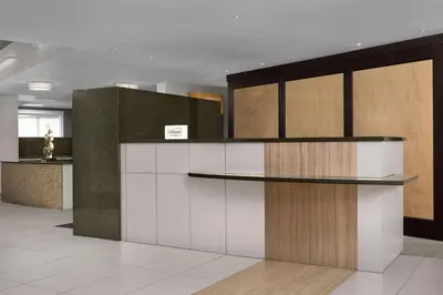 a lobby with a counter in a building at Homewood Suites by Hilton Reading-Wyomissing in Wyomissing
