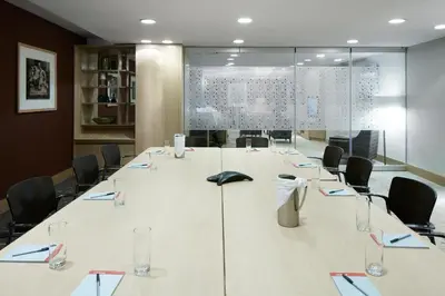 a large conference room with a large table and chairs at Club Quarters Hotel World Trade Center, New York in New York