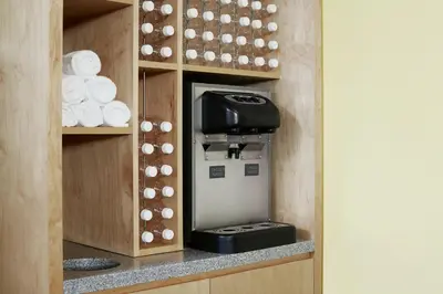 a kitchen with a printer and paper towels at World Center Hotel in New York