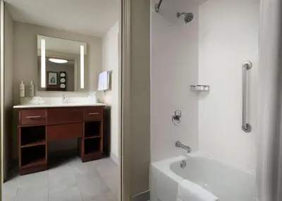 a bathroom with a tub and a sink and a shower at Homewood Suites by Hilton Somerset in Somerset
