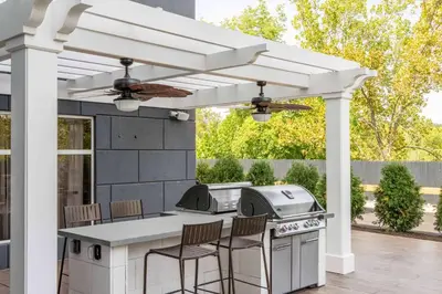 a white pergola with a grill on a patio at Homewood Suites by Hilton Philadelphia Plymouth Meeting in Plymouth Meeting