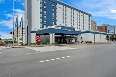 an empty street in front of a hotel at DoubleTree by Hilton Downtown Wilmington - Legal District in Wilmington