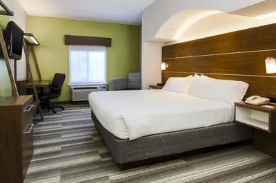 a hotel room with a bed and a desk at Holiday Inn Express Philadelphia NE - Langhorne by IHG in Langhorne