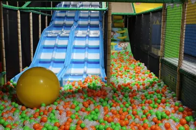 a large pile of balls in a play area at Holiday Inn Express Philadelphia NE - Langhorne by IHG in Langhorne