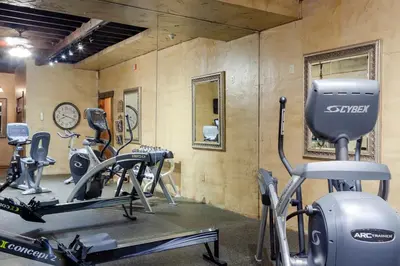 a gym with several exercise bikes in a room at The Inn at Leola Village, a Historic Hotel of America in Lancaster