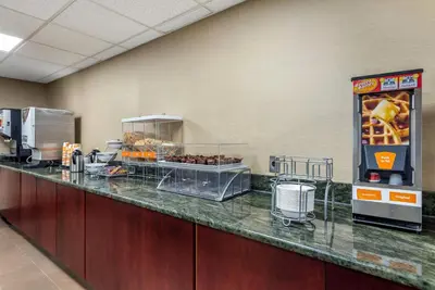 a buffet line with food on it in a hotel room at Comfort Inn & Suites Glen Mills - West Chester in Glen Mills