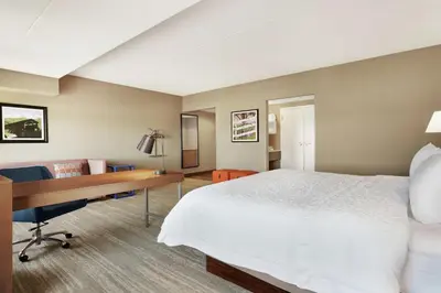 a hotel room with a desk and a bed at Hampton Inn & Suites Ephrata - Mountain Springs in Ephrata