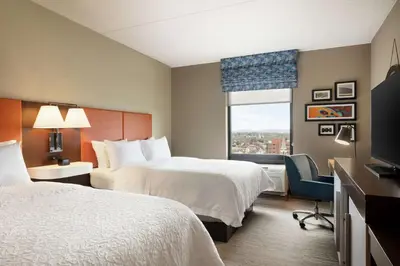 a hotel room with two beds and a window at Hampton Inn & Suites Ephrata - Mountain Springs in Ephrata