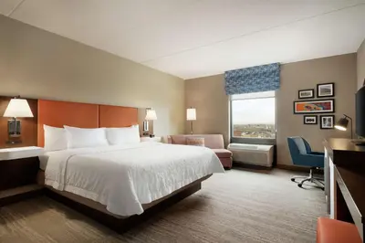 a hotel room with a bed and a window at Hampton Inn & Suites Ephrata - Mountain Springs in Ephrata