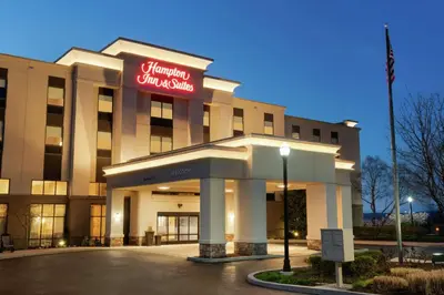 a hotel with a sign on the front of it at Hampton Inn & Suites Ephrata - Mountain Springs in Ephrata