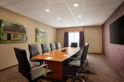 a conference room with a long table and chairs at Hampton Inn & Suites Ephrata - Mountain Springs in Ephrata