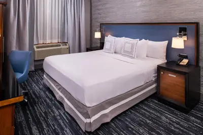 a large white bed in a hotel room at Fairfield By Marriott New York Manhattan Times Square in New York