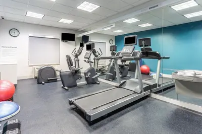 a gym with treadmills and cardio equipment in a room at Holiday Inn Express & Suites White Haven - Poconos by IHG in White Haven