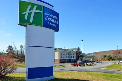 a sign in front of a building with a street at Holiday Inn Express & Suites White Haven - Poconos by IHG in White Haven
