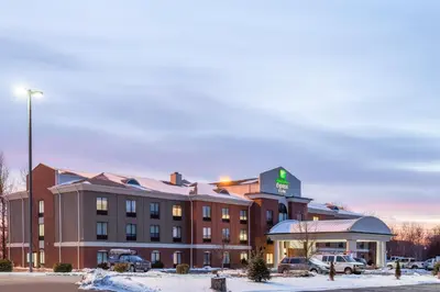 a hotel in a parking lot in the snow at Holiday Inn Express & Suites White Haven - Poconos by IHG in White Haven