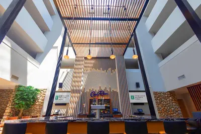 a view of the lobby of a building with a stage at Embassy Suites by Hilton Philadelphia Valley Forge in Wayne