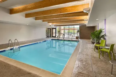 a large pool with blue water in a hotel room at Home2 Suites by Hilton Downingtown Exton Route 30 in Downingtown