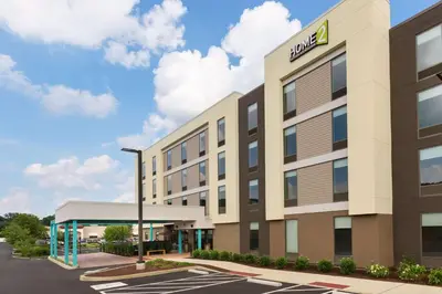an image of a hotel building with a parking lot at Home2 Suites by Hilton Downingtown Exton Route 30 in Downingtown