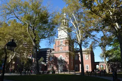 a building with a clock tower on top of it at Alexander Inn in Philadelphia