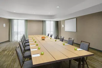 a large conference room with a long table and chairs at Courtyard by Marriott Philadelphia Montgomeryville in North Wales