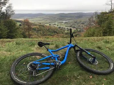 a bike parked on top of a grassy hill at Holiday Inn Binghamton-Downtown Hawley Street by IHG in Binghamton