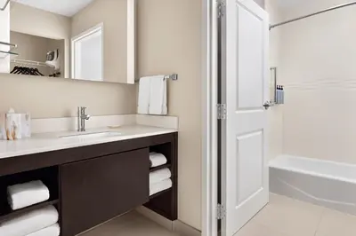 a bathroom with a sink and a shower at Residence Inn by Marriott Philadelphia Langhorne in Langhorne
