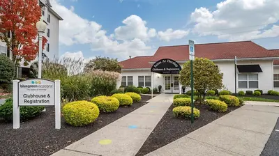 a hotel with a sign in front of a building at Bluegreen Vacations Suites at Hershey in Hershey