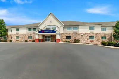 a building with a driveway in front of it at Candlewood Suites Hazleton by IHG in Hazleton