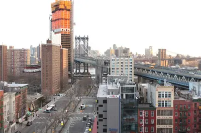 a view of a city with a bridge and buildings at Hotel Richland LES in New York
