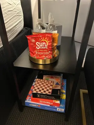 a table with a box of sun games on it at Hotel Richland LES in New York