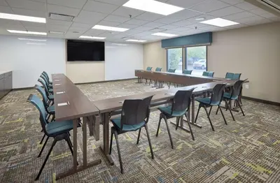 a conference room with a long table and chairs at Hampton Inn by Hilton Harrisburg West in Mechanicsburg