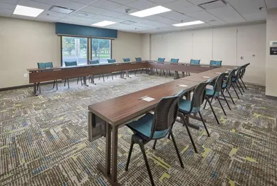 a conference room with a long table and chairs at Hampton Inn by Hilton Harrisburg West in Mechanicsburg