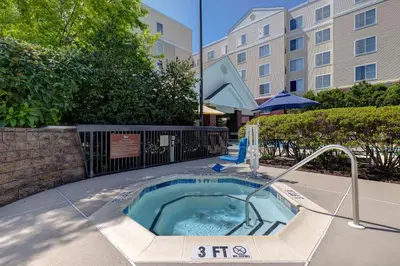 a jacuzzi in the courtyard of a building at Homewood Suites Lansdale in Lansdale