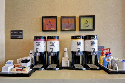 a group of coffee makers on a counter in a room at Hampton Inn Scranton at Montage Mountain in Scranton