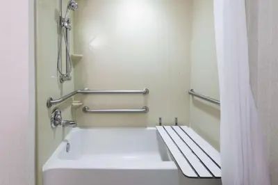 a bathroom with a white sink and a shower at Hampton Inn South Plainfield-Piscataway in South Plainfield