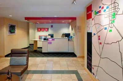a lobby of a hospital with a map on the wall at TownePlace Suites by Marriott Bethlehem Easton/Lehigh Valley in Hollo