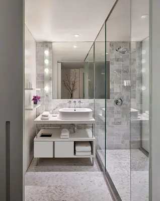 a bathroom with a sink and a shower at Smyth Tribeca in New York
