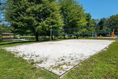 a volleyball court in a park with at Hershey Camping Resort Park Model 6 in Mount Wilson