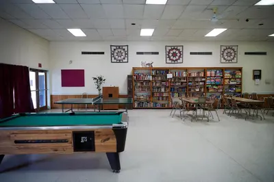 a room with a pool table in a library at Hershey Camping Resort Loft Park Model 7 in Mount Wilson