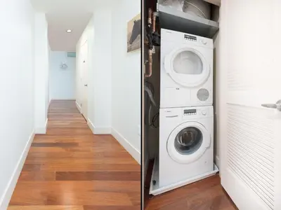 a laundry room with a washer and dryer at Fantastic Philly Fully Furnished Apartments in Philadelphia