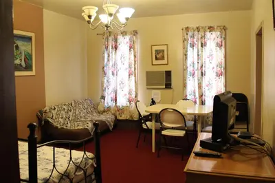 a living room with a couch and a table at Beauty Near Times Square in New York