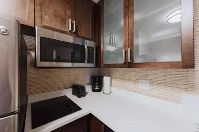 a kitchen with a white counter top and a microwave at Residence Inn by Marriott Philadelphia Glen Mills/Concordville in Glen Mills