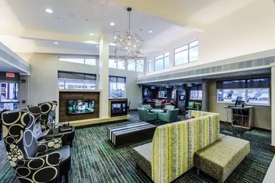a living room with couches and a fireplace at Residence Inn by Marriott Philadelphia Glen Mills/Concordville in Glen Mills