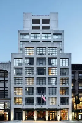 a building with an american flag in front of it at The Whitby Hotel in New York