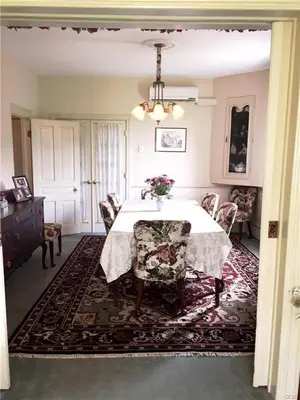 a dining room with a table and chairs at Hillcrest Bed and Breakfast in Jim Thorpe