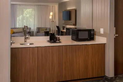 a microwave on a counter in a hotel room at Courtyard by Marriott Hershey Chocolate Avenue in Hershey