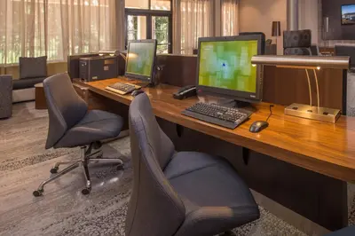 an office with a desk with two computers on it at Courtyard by Marriott Hershey Chocolate Avenue in Hershey